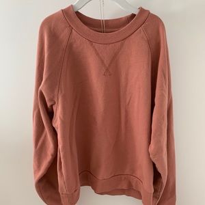 peach pink pullover long sleeve crewneck